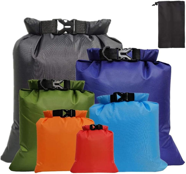 Assorted waterproof dry bags and Chums floating phone case for secure storage and phone protection during kayaking, boating, hiking, camping, and beach activities.