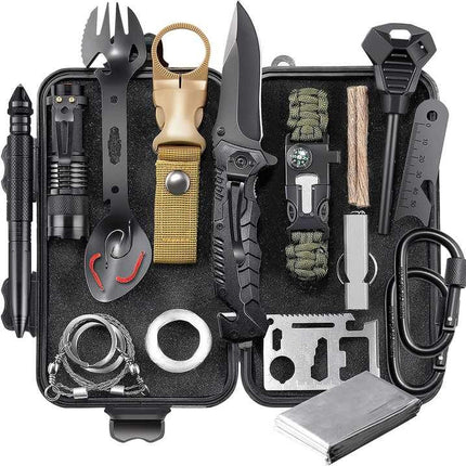 Compact survival kit in black hard case with tactical knife, flashlight, fire starter, paracord bracelet, emergency whistle, wire saw, multi-tool card, carabiner, spoon fork utensil, and outdoor emergency gear neatly organized inside.