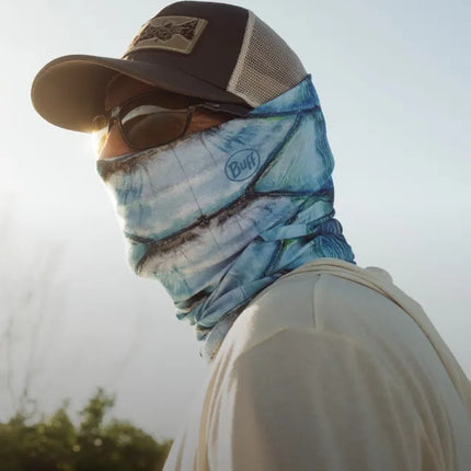 Man wearing Buff neckwear in blue and white with sunglasses and a hat while being protected from the UV sun rays and insects.