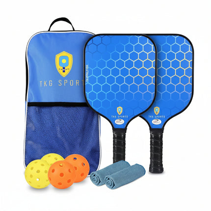 Two blue pickleball paddles with a carrying case, balls, and cloths on a white background