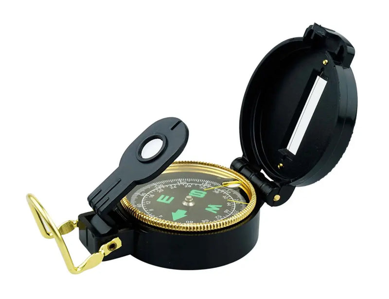 Black and gold compass with an open lid and a small magnifying glass