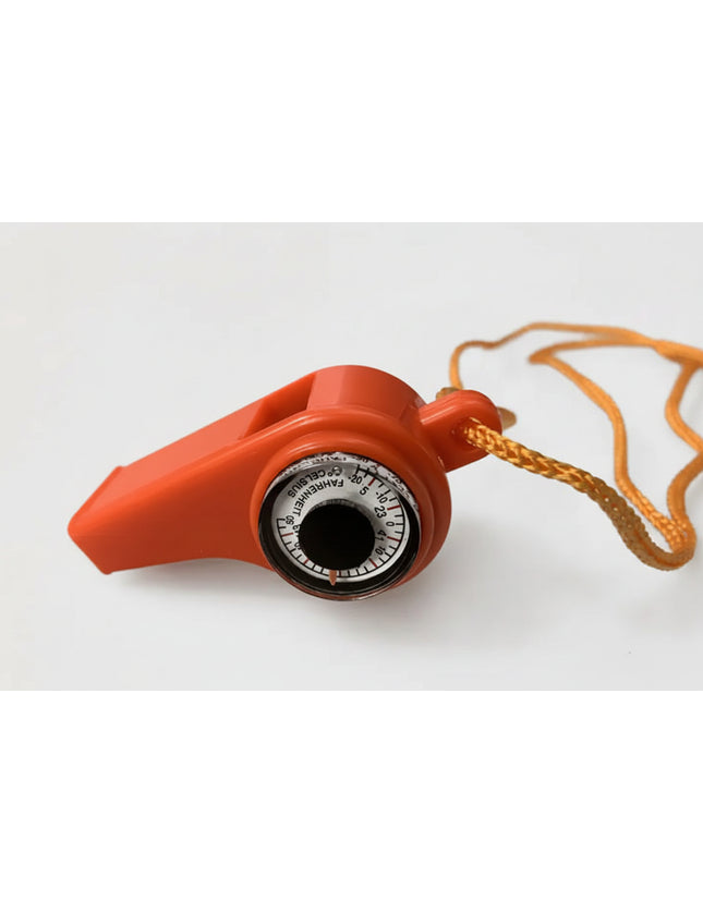 Orange whistle with a built-in thermometer showing Fahrenheit and Celsius scales