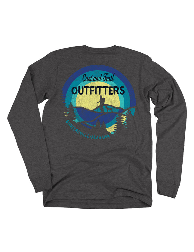 Gray long-sleeve shirt with a graphic design on the back featuring 'Cast and Trail Outfitters' and a silhouette of a person hiking and a dog