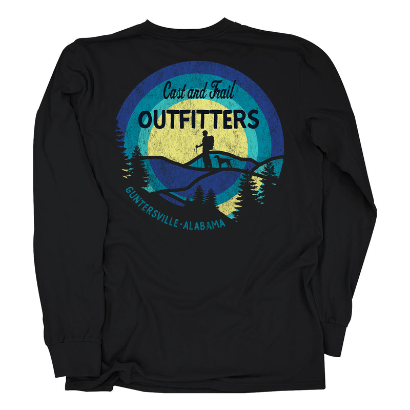Black long sleeve t-shirt with a circular graphic of a hiker and dog in a forest with a yellow and blue background