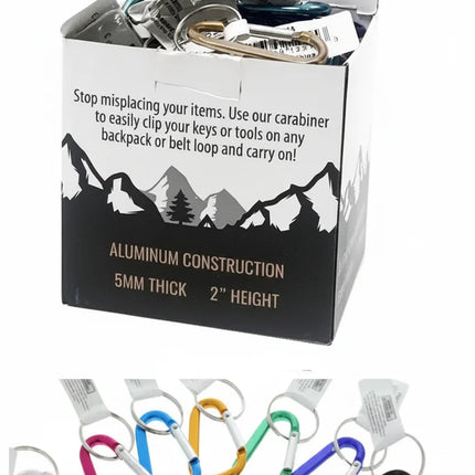 Display box of aluminum carabiners with key rings in various colors, including white, pink, blue, gold, green, purple, and black