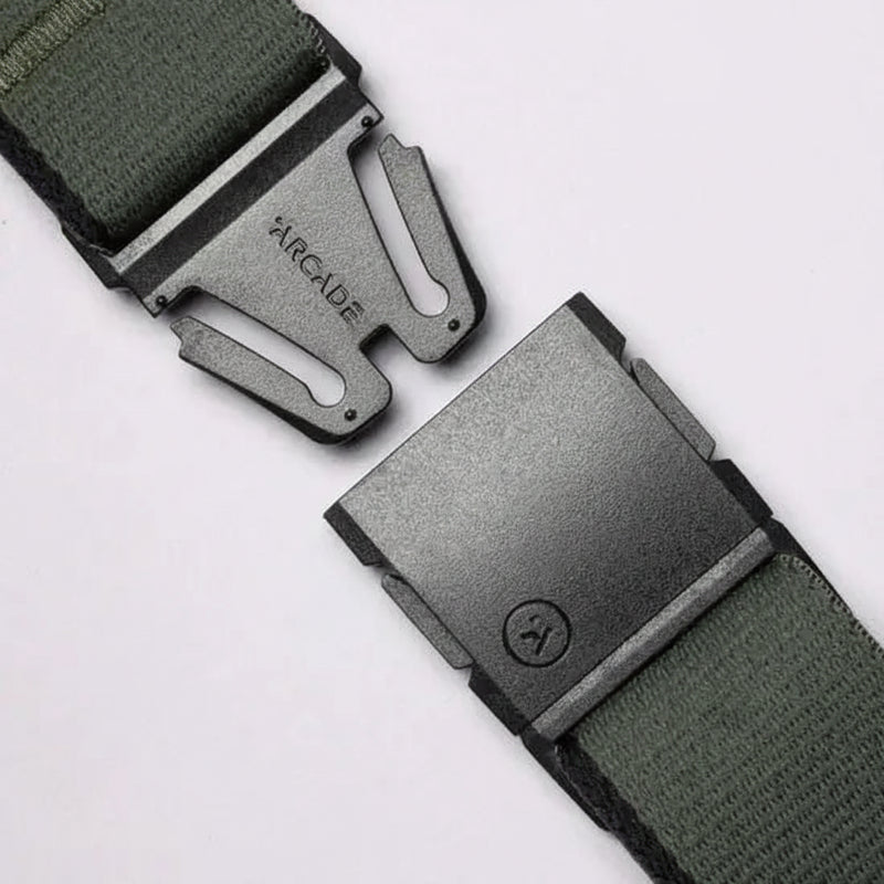 Arcade brand belt buckle, unfastened, with the brand name on the left side and a logo on the right