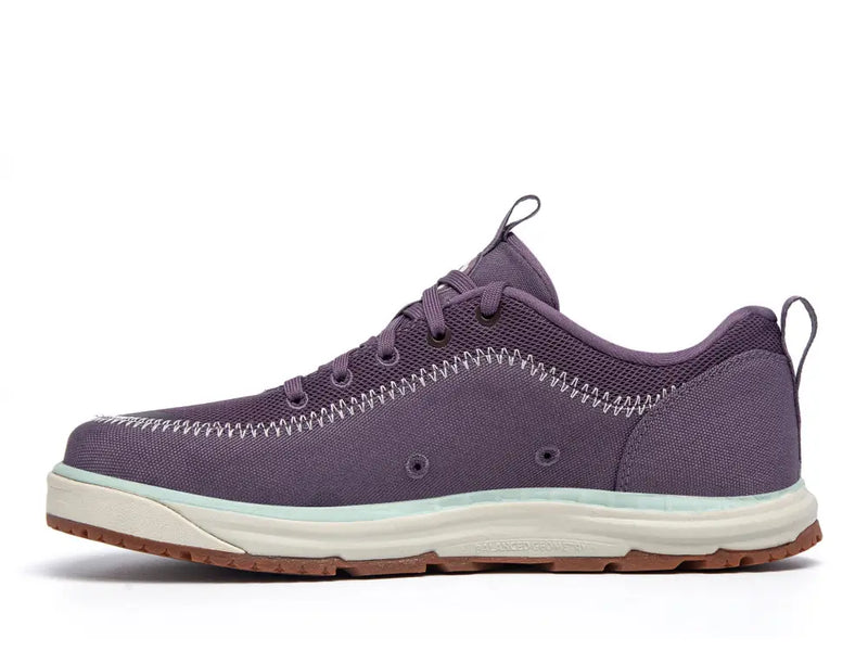 Purple sneaker with white stitching, light blue trim, and a brown sole