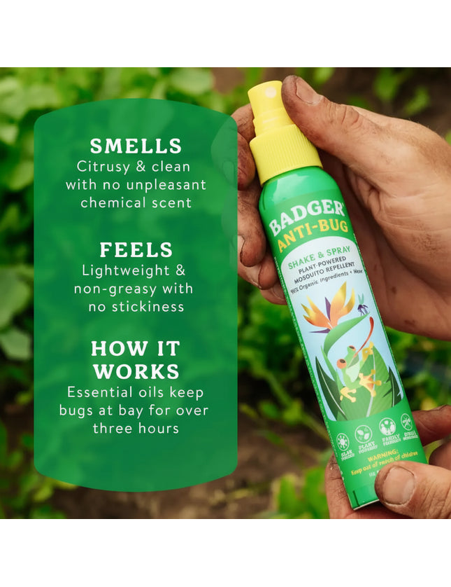 Hand holding a green bottle of Badger Anti-Bug spray with text describing its scent, feel, and how it works