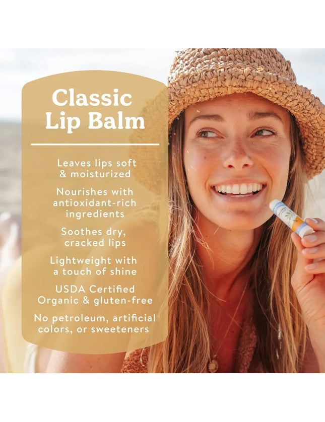 Woman in a straw hat applying lip balm, with text Classic Lip Balm and product benefits