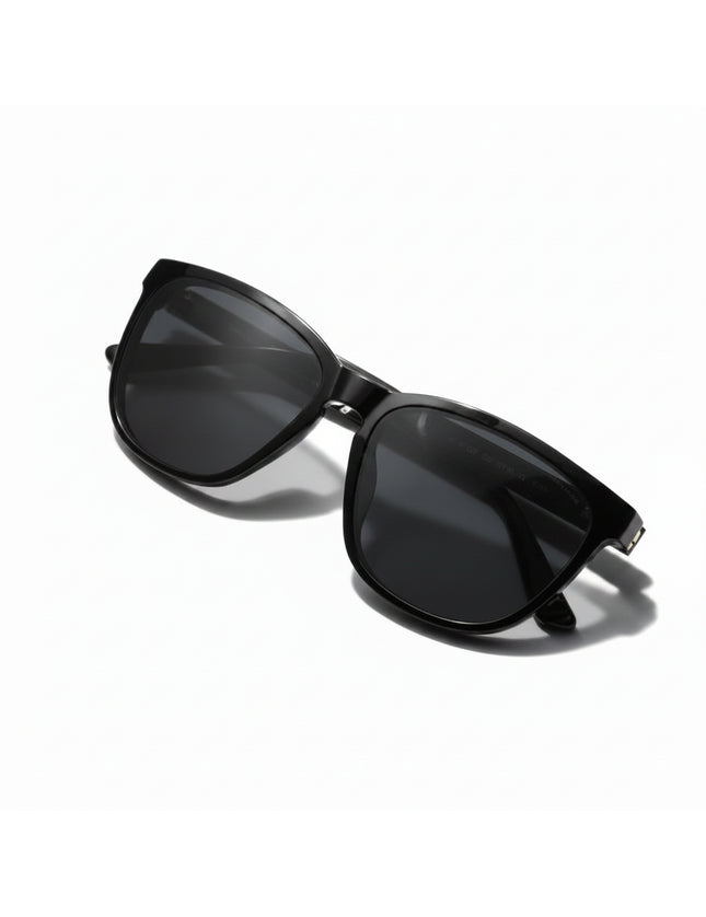 Black sunglasses with dark lenses