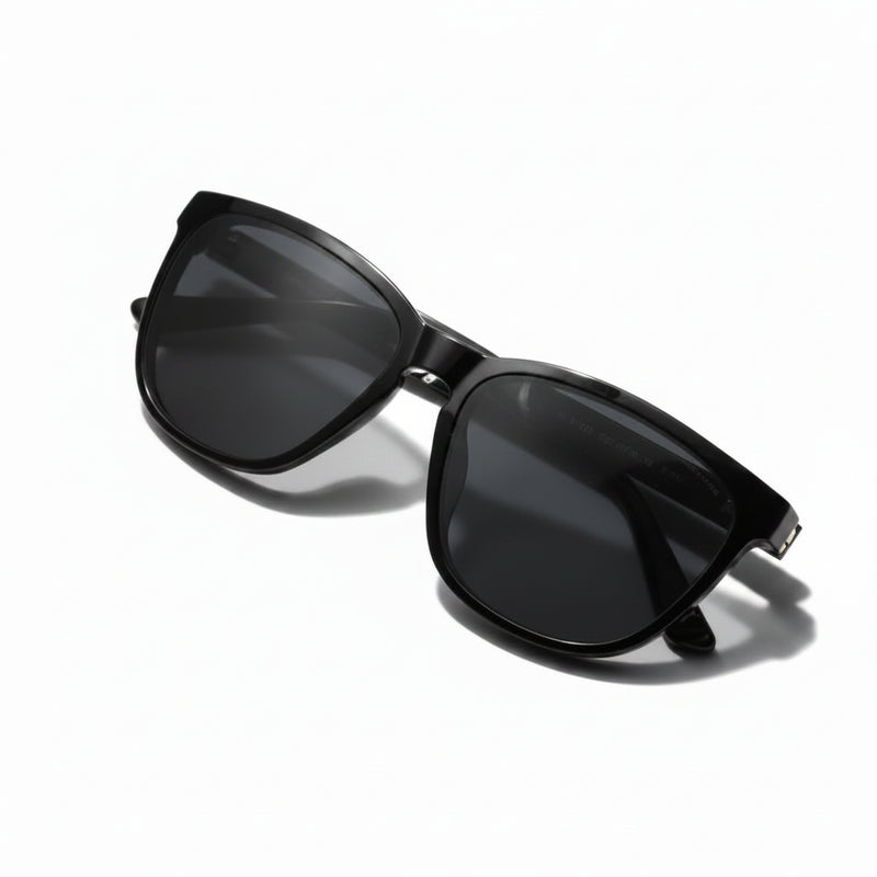 Black sunglasses with dark lenses