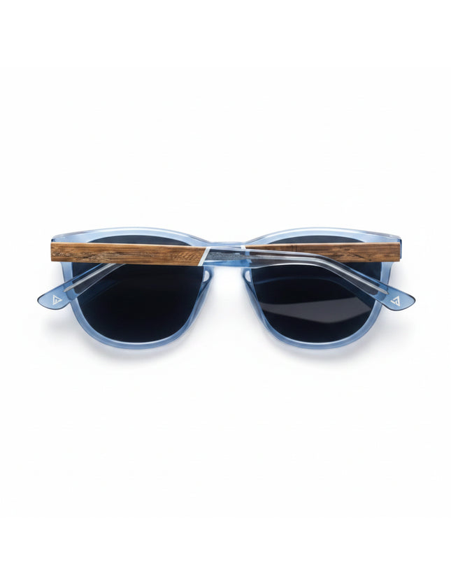 Blue sunglasses with dark lenses and wooden arms