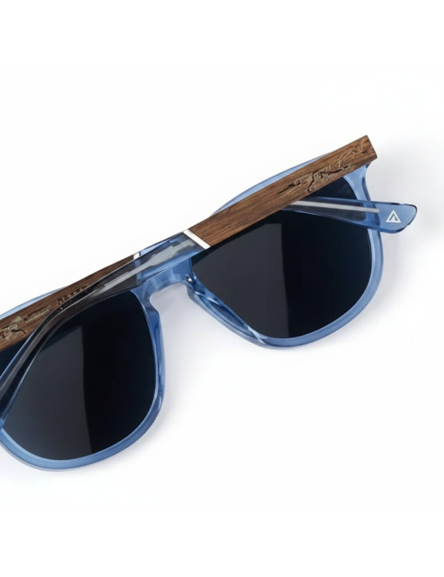 Blue sunglasses with dark lenses and wooden arms