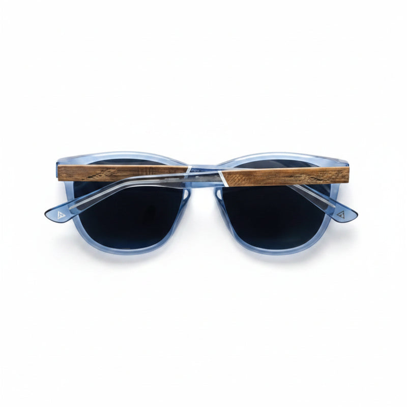 Blue sunglasses with dark lenses and wooden arms