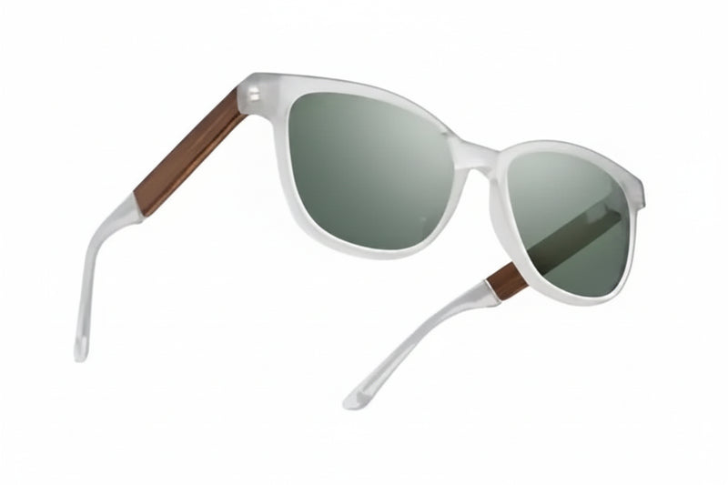 White sunglasses with green lenses and brown accents on the arms