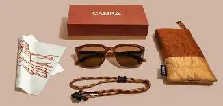 Brown sunglasses, case, strap, cleaning cloth, and box