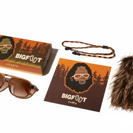 Bigfoot Camp sunglasses, box, card, strap, and furry pouch