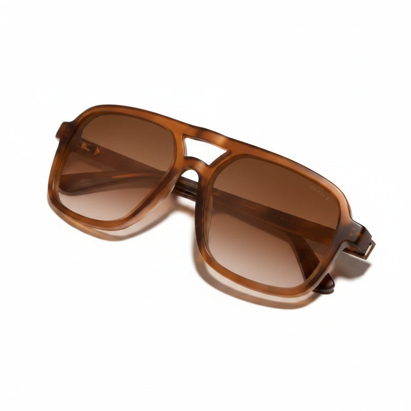 Brown tortoise shell sunglasses with gradient lenses