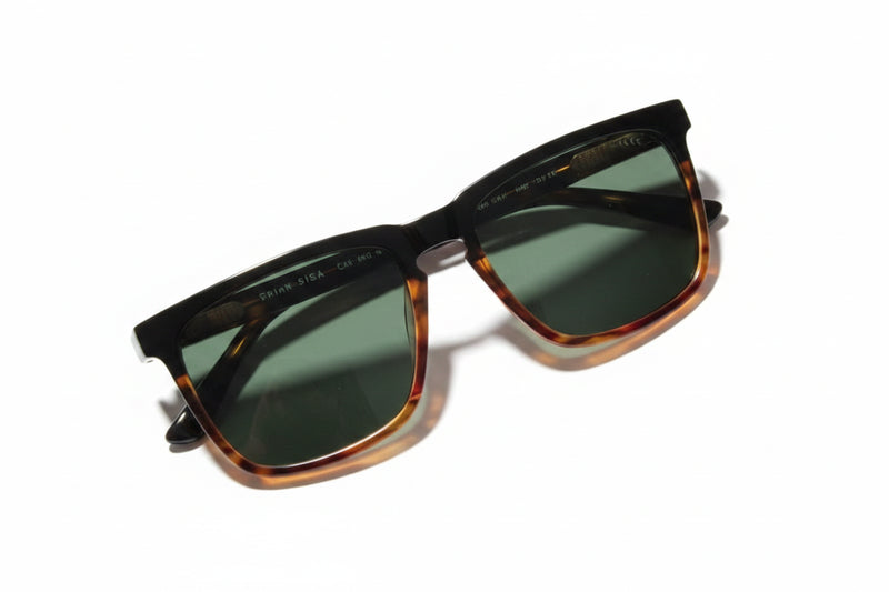 Black and tortoiseshell sunglasses with dark lenses
