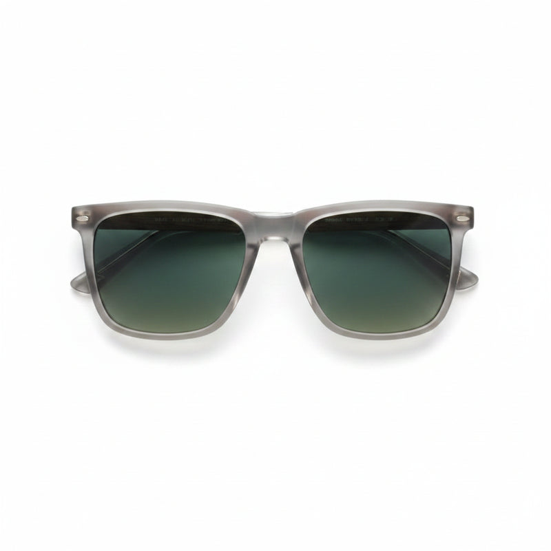 Top-down view of sunglasses with clear frames, green lenses, and wood-grain arms