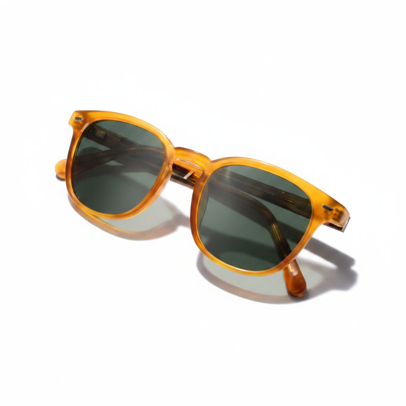 Amber tortoiseshell sunglasses with dark lenses