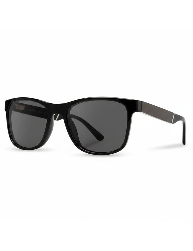 Black sunglasses with dark grey lenses and metal arms