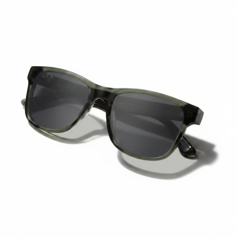 Dark green sunglasses with dark lenses