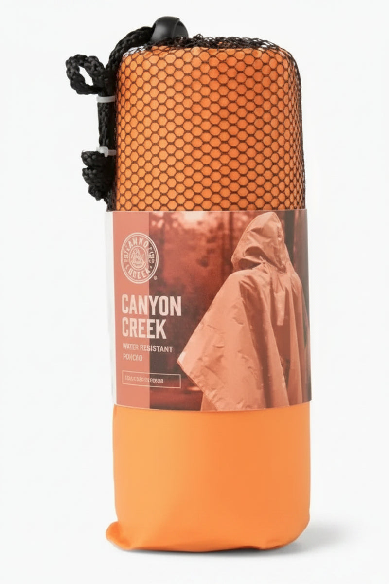 Canyon Creek poncho in orange packaging