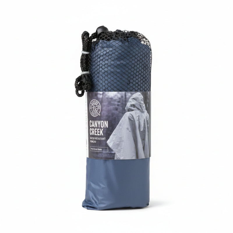 Canyon Creek poncho in a blue storage bag