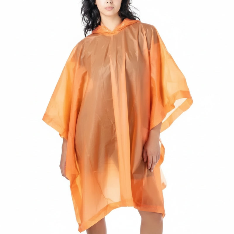 Woman wearing an orange waterproof poncho