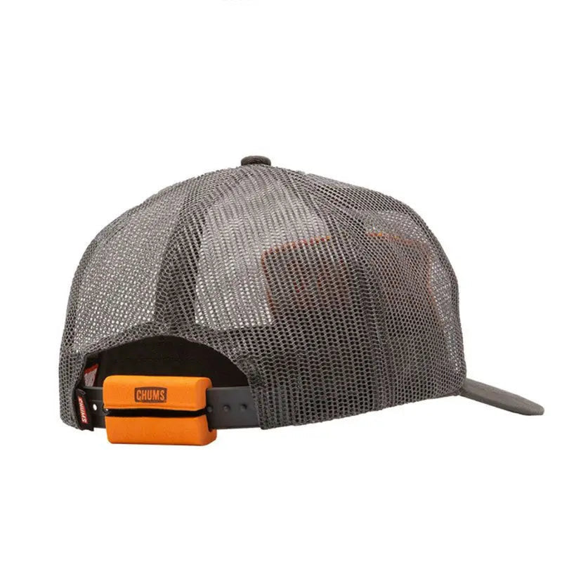 Back of a grey mesh trucker hat with an orange Chums brand clip attached to the adjustable strap