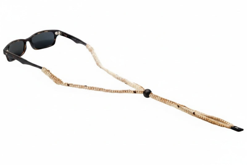 Black sunglasses with a beige and black braided strap