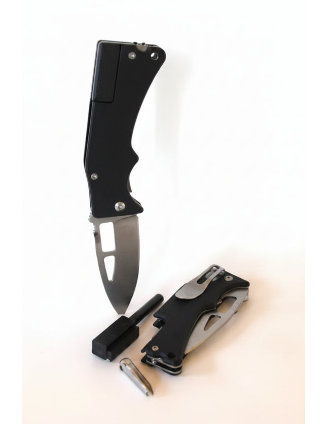 Two black folding knives, one open and one closed, with a small black sharpening tool and a silver bullet