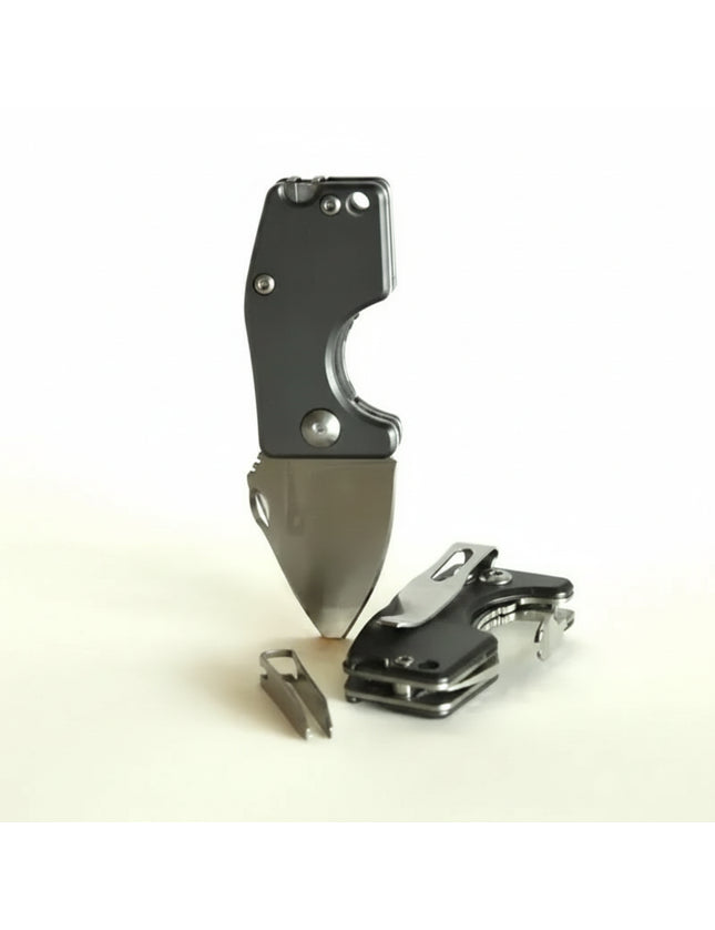 Two small folding knives, one open and one closed, with a pair of tweezers