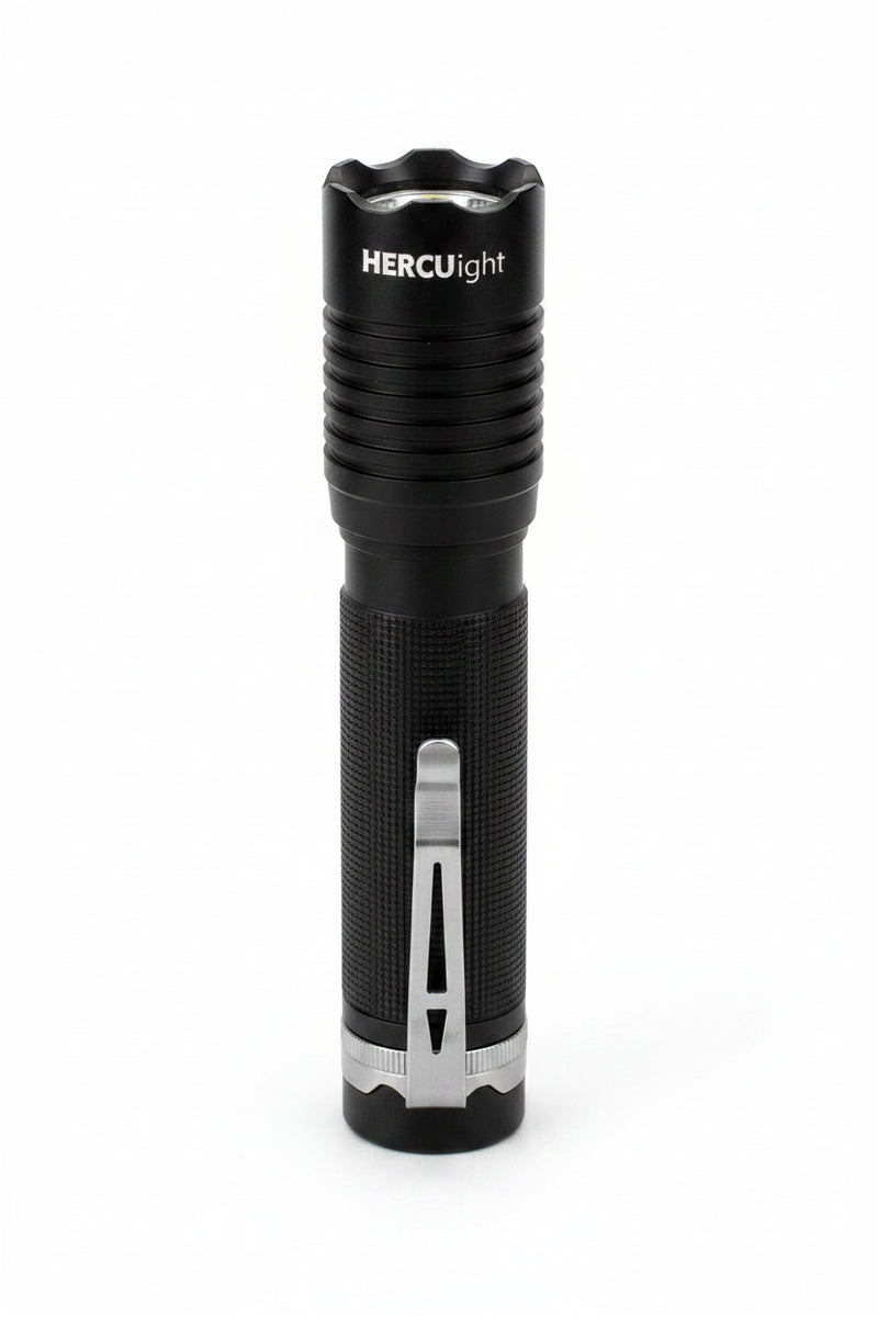 Black flashlight with silver clip and base