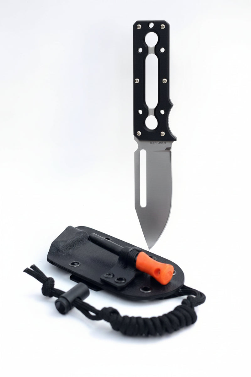 Black handled knife with a grey blade, black sheath, and an orange and black fire starter