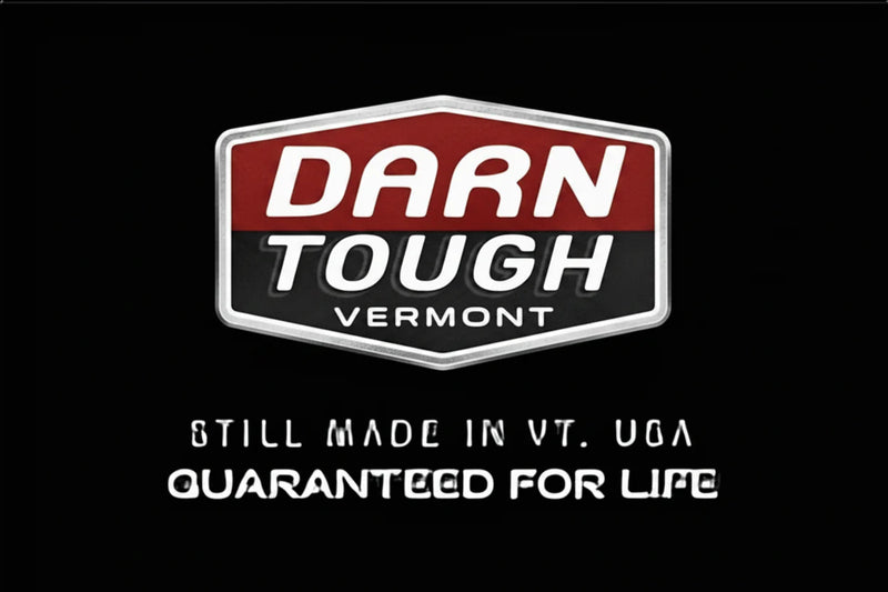 Darn Tough Vermont logo with text Still Made in VT USA Guaranteed for Life