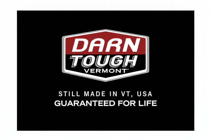 Darn Tough Vermont logo on a black background with text about product origin and guarantee.