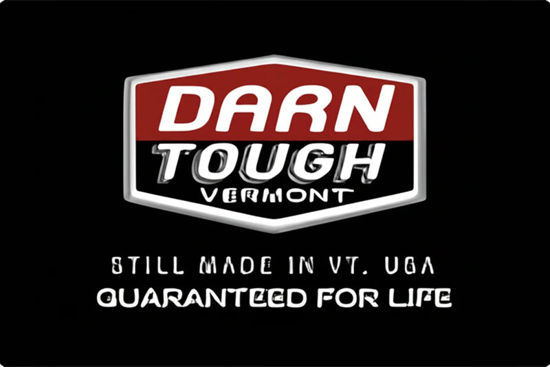 Darn Tough Vermont logo with text Still Made in VT, USA Guaranteed for Life