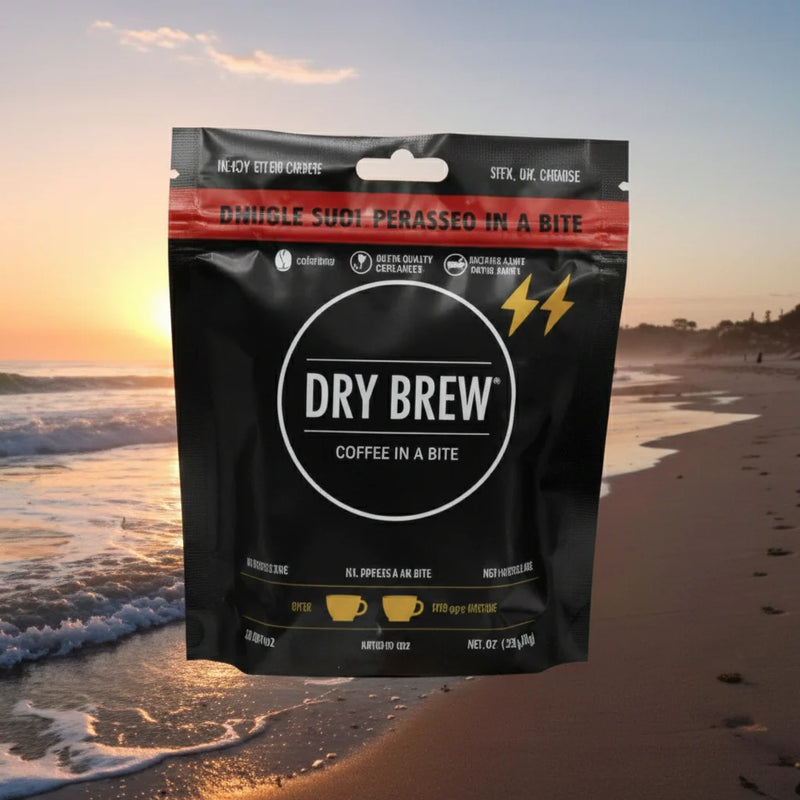 Dry Brew coffee in a bite packaging on a beach at sunset