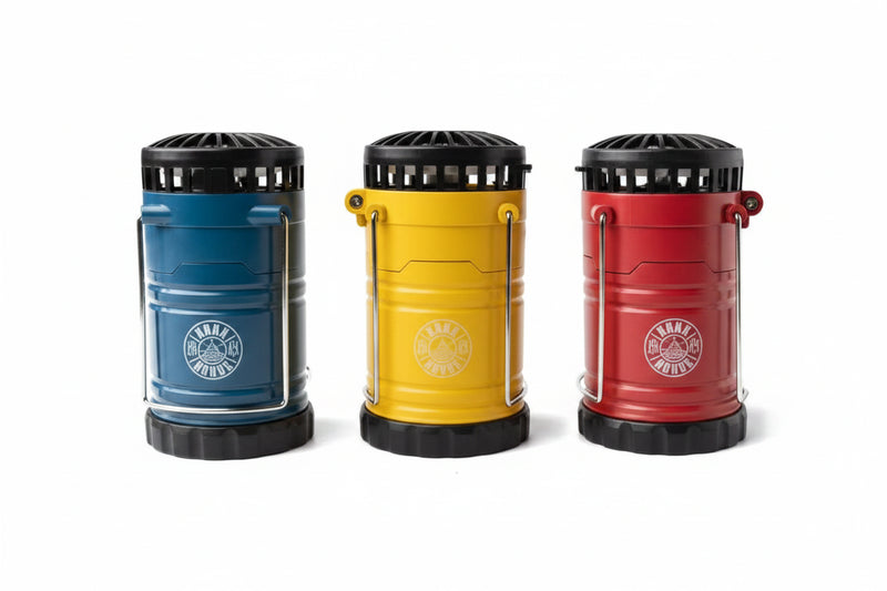 Three cylindrical mosquito coils in blue, yellow, and red, with black tops and metal handles