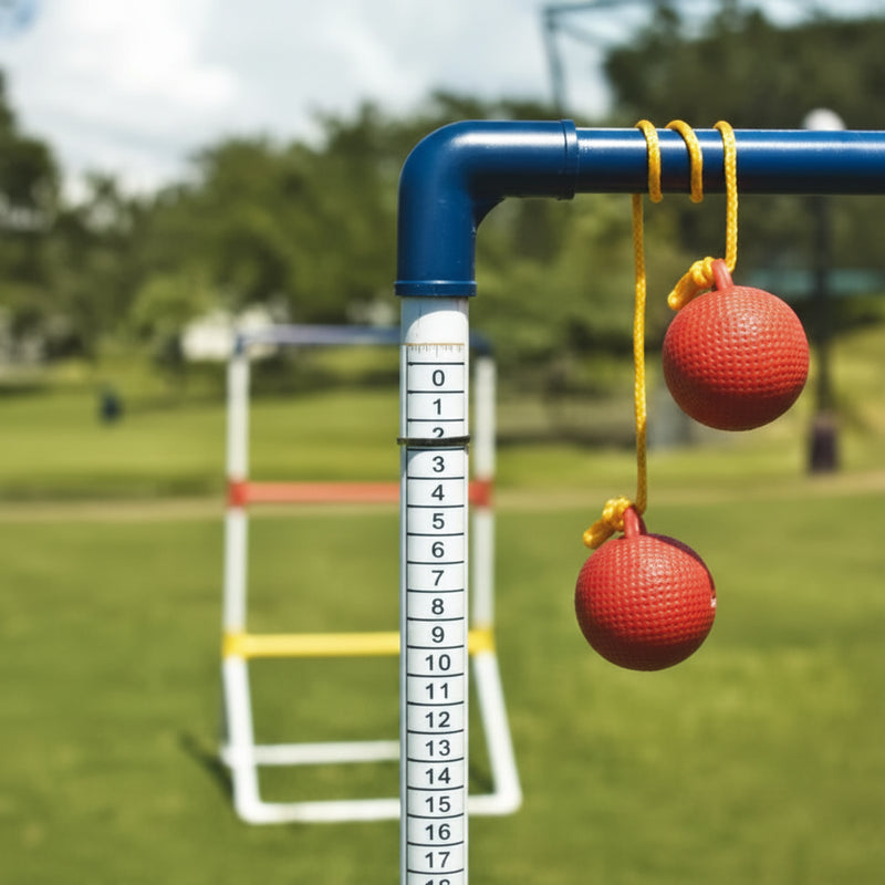 Two red bolas hanging from a blue ladder golf bar with a numbered white pole