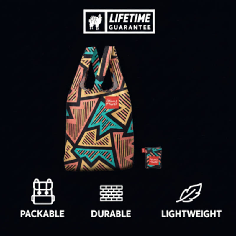 Black background with a colorful patterned tote bag and a small matching pouch