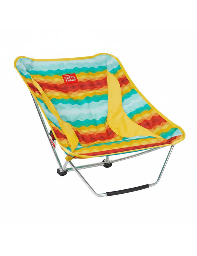 Colorful striped low beach chair with yellow accents