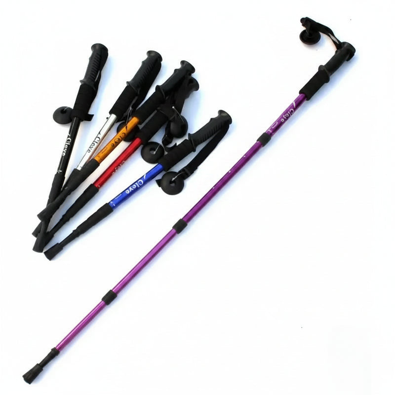 Collection of trekking poles in various colors, including black, white, orange, red, blue, and purple