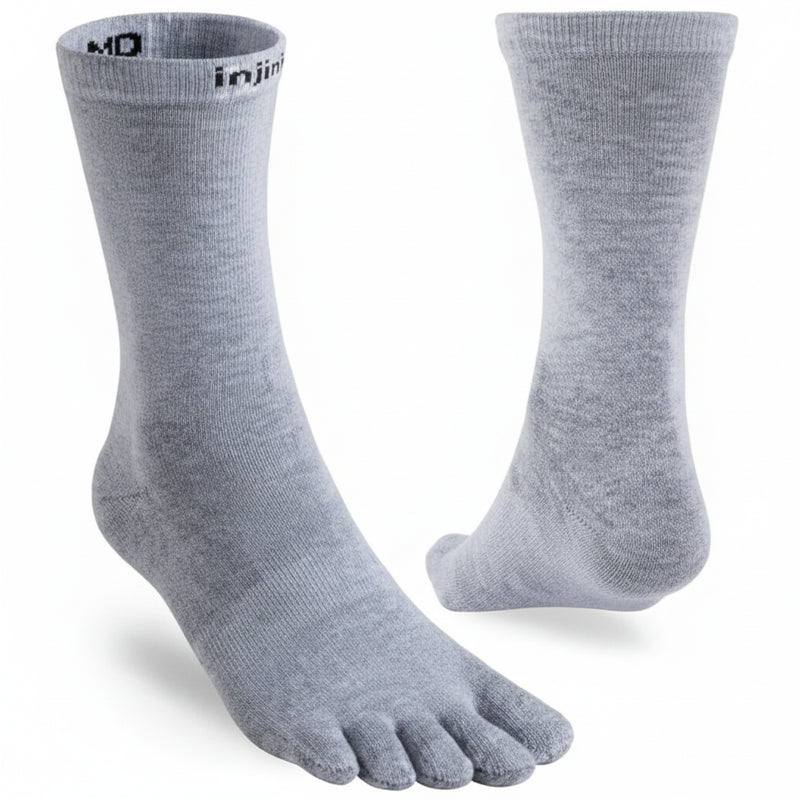 Light grey Injinji toe socks, one shown from the side and the other from the back