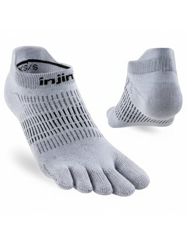 Light grey Injinji toe socks with black stripes on the top and heel