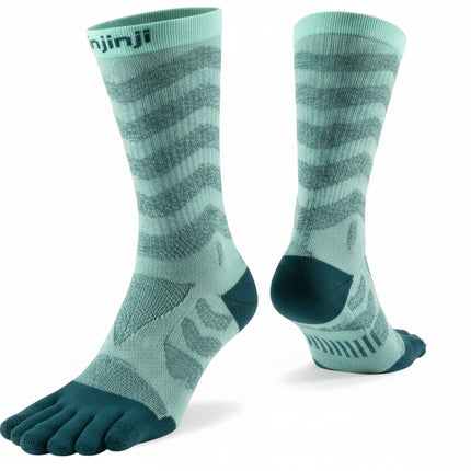 Pair of Injinji toe socks in light green with dark green toes and heels