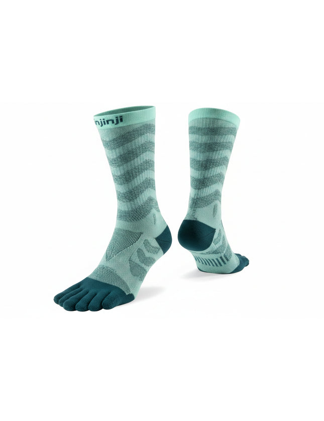 Pair of Injinji toe socks in light green with dark green toes and heels