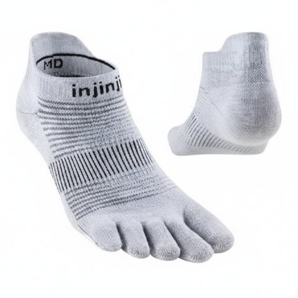 Pair of light grey Injinji toe socks with black stripes on a white background